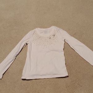 A girls long sleeve shirt